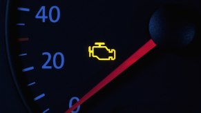 A vehicle flashes a check engine light as it enters 'limp mode'.