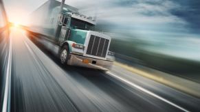 A trucker speeding in their semi-truck.