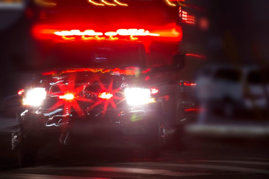 An EMT or paramedic uses lights and sirens while driving an ambulance.