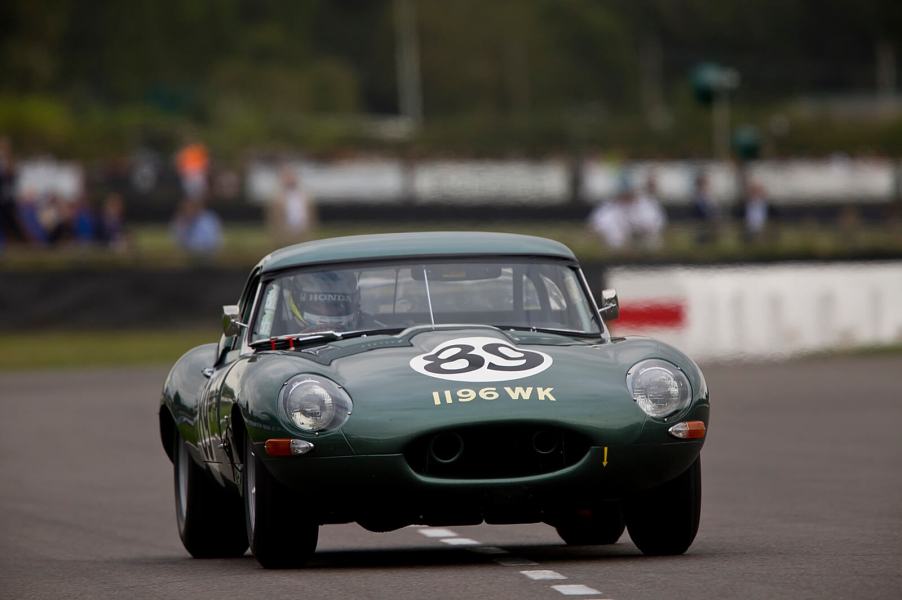 A 1963 Jaguar E-Type in British racing green at Goodwood.