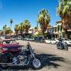 A motorcycle in a parking spot along the road in California.