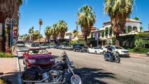 A motorcycle in a parking spot along the road in California.