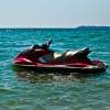 A jet ski is designed to resist sinking, like this one floating off-shore.