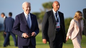 Joe Biden smiling outside