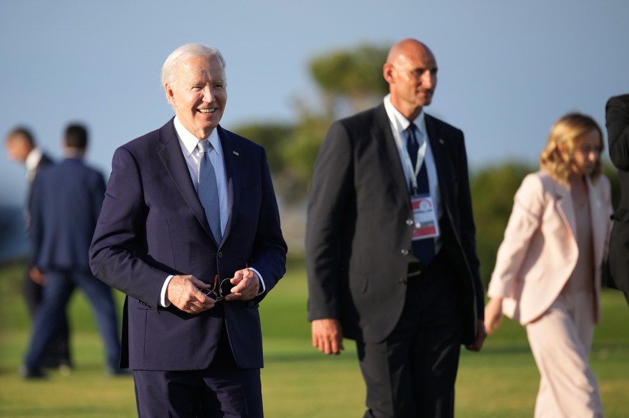 Joe Biden smiling outside