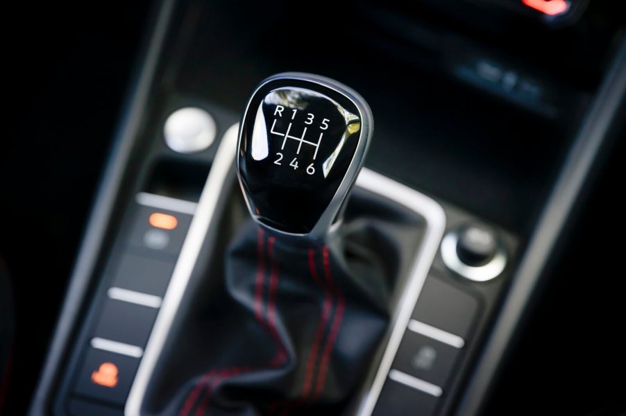 A manual transmission shifter in a Volkswagen Jetta GLI.