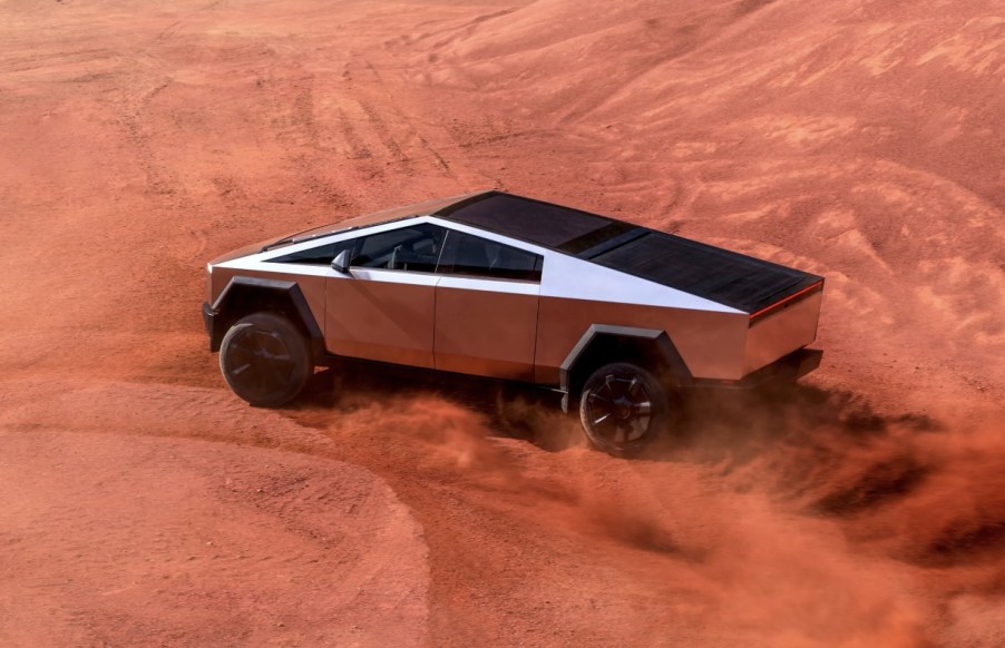 The Tesla Cybertruck kicking up dirt