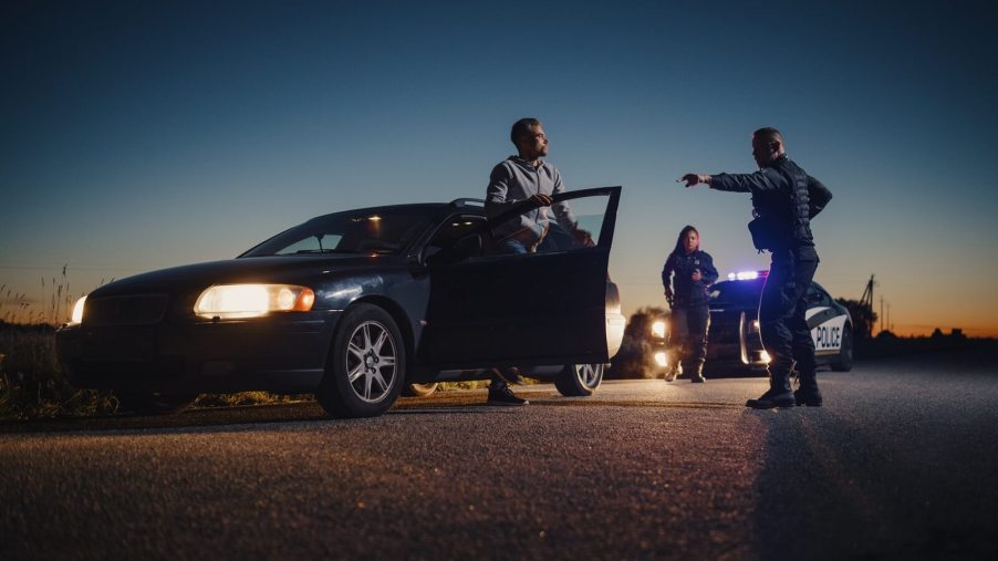 A heated exchange at a traffic stop where police officers pulled a driver over.