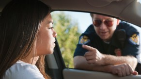 There are certain things drivers shouldn't do if pulled over by the police for a traffic stop after seeing squad car lights.