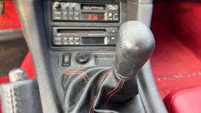 The stick shift lever in a 1992 Dodge Stealth.