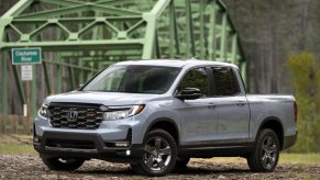 The 2024 Honda Ridgeline parked near a bridge