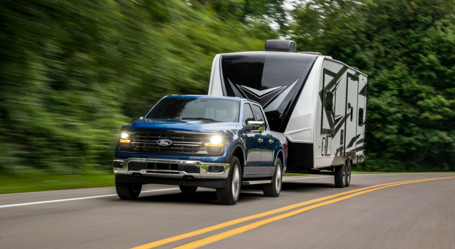 The 2024 Ford F-150 Hybrid towing a camper