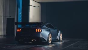 A Ford Mustang GTD supercar in partial shadows.