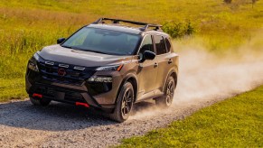 The 2025 Nissan Rogue Rock Creek Edition on a gravel road