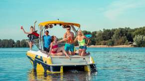 People drinking on a boat during the summer