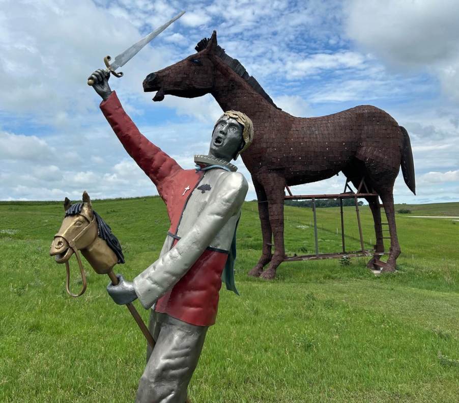 Two statues at a popular road trip stop in South Dakota.