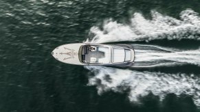 Overhead view of a Maserati yacht in the ocean.