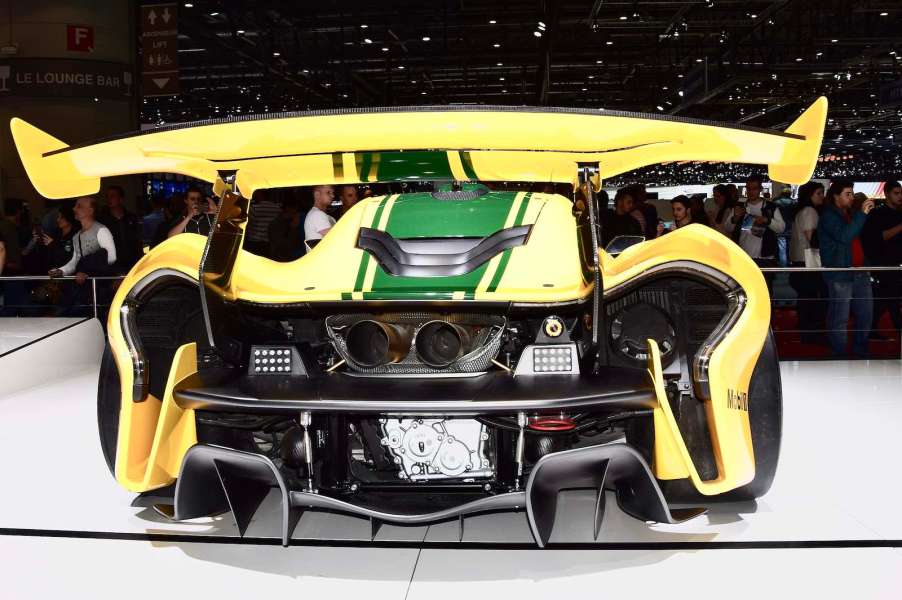 Rear of a bright yellow McLaren P1 race car.