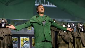 Robert Downey Jr. extends his hands on stage at San Diego Comic-Con