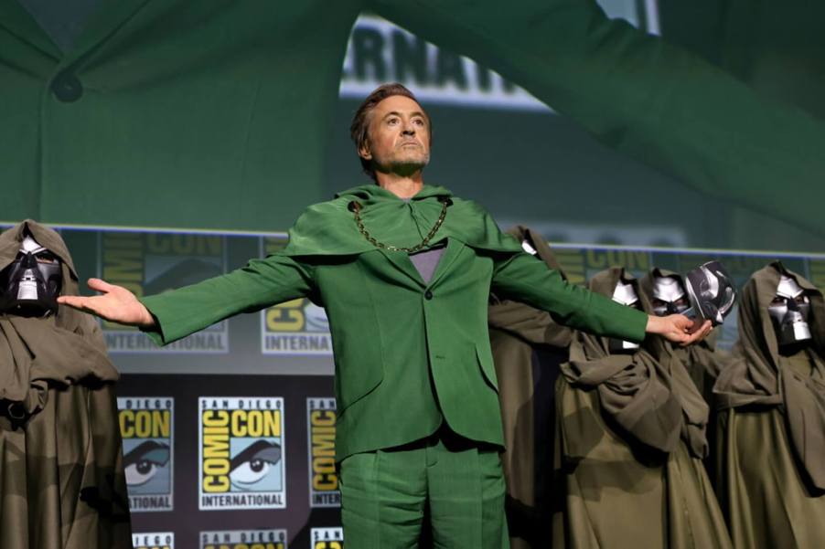 Robert Downey Jr. extends his hands on stage at San Diego Comic-Con