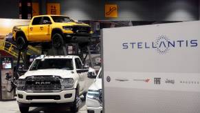 A Stellantis sign in front of Ram trucks at the Chicago Auto Show