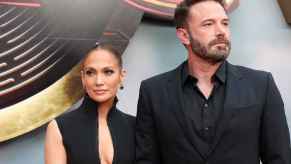 Ben Affleck and Jennifer Lopez stand on the red carpet together in 2023