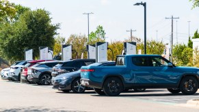 An Electrify America EV charging station full of electric cars.