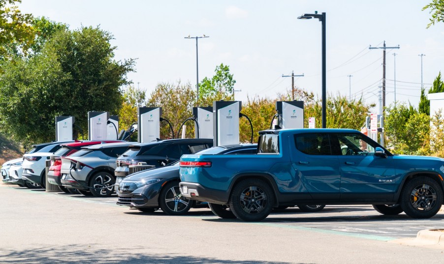 An Electrify America EV charging station full of electric cars.