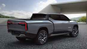 Ram 1500 Revolution BEV concept pickup truck rendering in right side rear angle has third-row seating