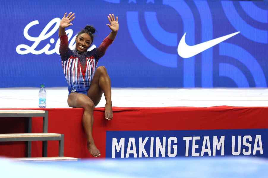 Simone Biles waves to crowd at the 2024 U.S. Olympic Gymnastics Team Trials