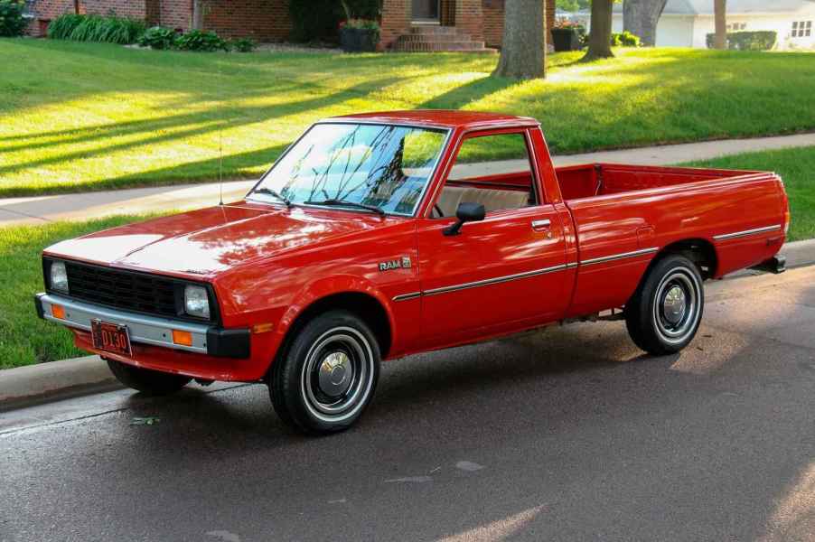 A red 1982 Dodge Ram 50 classic compact truck with pre-facelift headlights