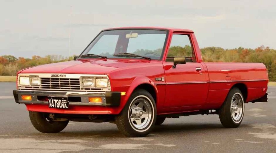 A red 1986 Dodge Ram 50 vintage truck compact truck