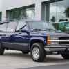 A blue 1999 Chevrolet Suburban parked in right front angle view might be considered one of the best Chevrolet Suburban years