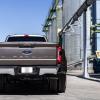 A 2023 Ford F-350 Super Duty dually pickup truck from the rear.