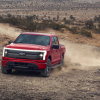 The 2024 Ford F-150 Lightning kicking up mud