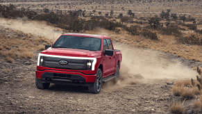 The 2024 Ford F-150 Lightning kicking up mud