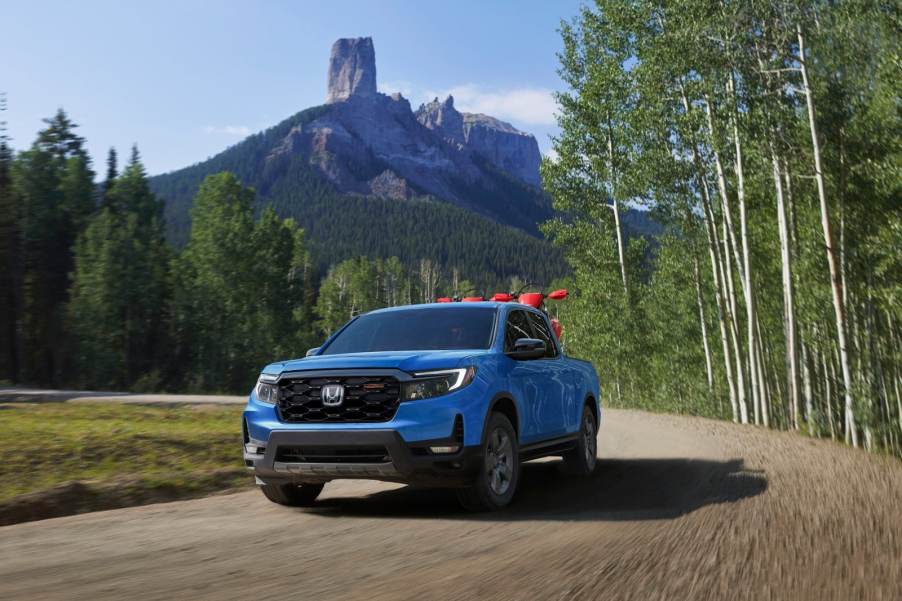 The 2024 Honda Ridgeline TrailSport on a dirt road