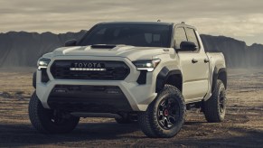 The 2024 Toyota Tacoma off-roading in dirt