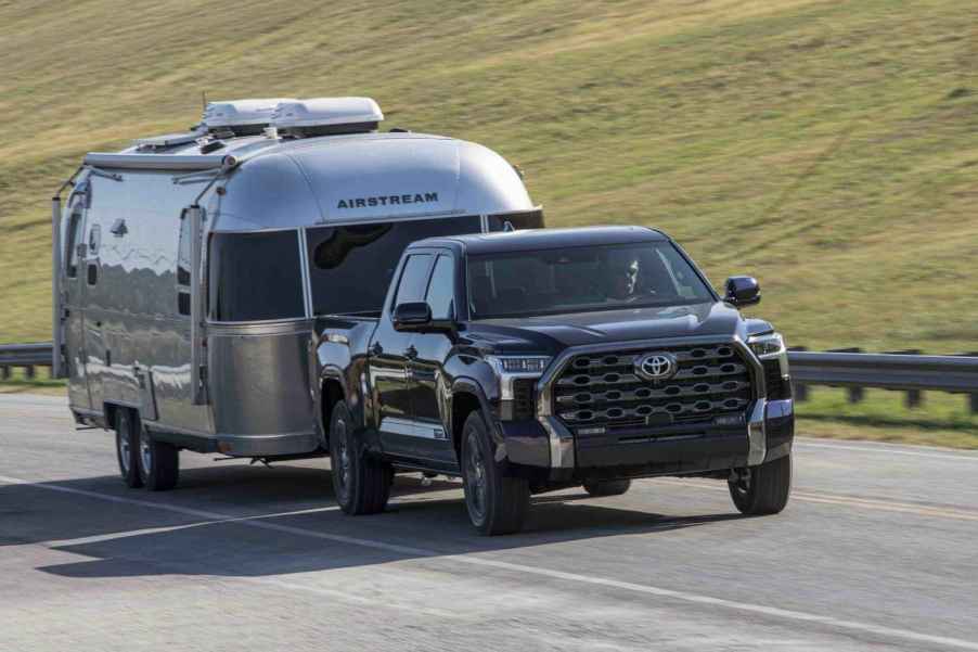 2024 Toyota Tundra shown towing an Airstream camper over 30K Toyota models recalled in 2024 over incorrect load carrying labels