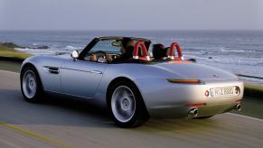 A BMW Z4 convertible, like the one Matthew Perry owned, drives up the coast.