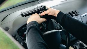 A driver with a replica gun in their car.