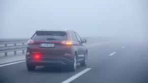 A Ford Edge avoids getting pulled over by police by signaling appropriately.