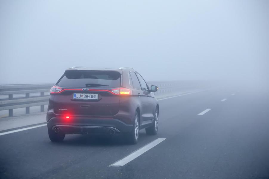 A Ford Edge avoids getting pulled over by police by signaling appropriately.