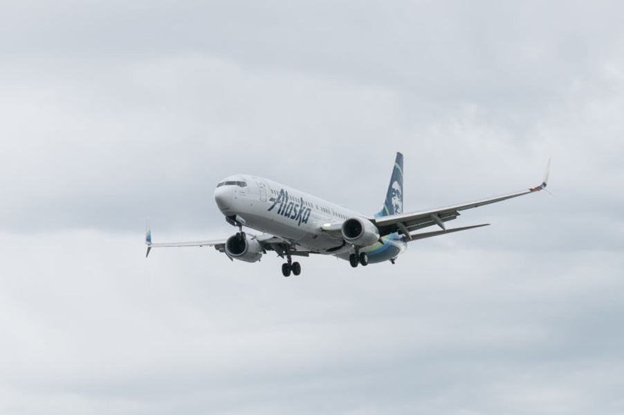 An Alaska Airlines Embraer E175LR with a certified airline pilot approaches a runway.