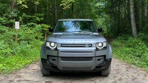 The 2024 Land Rover Defender 130's face in the woods