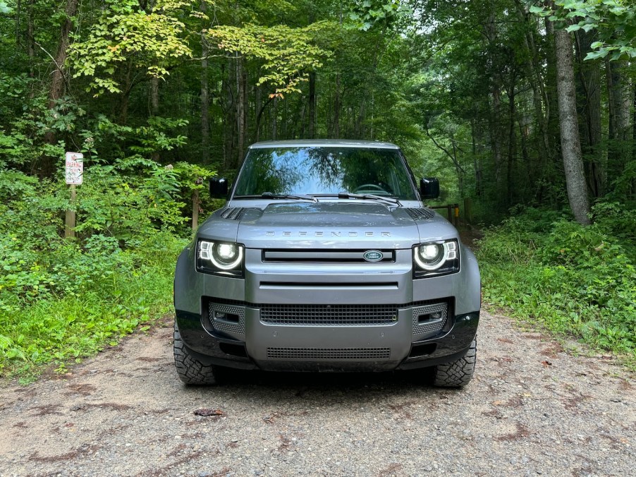 The 2024 Land Rover Defender 130's face in the woods