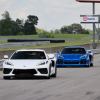 A pair of Chevrolet Corvette models get ready to hit the NCM Motorsports Park track.