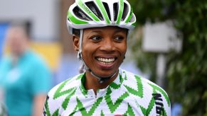 A bicyclist from Nigeria smiles during a tournament in Scotland