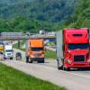 A series of truckers driving semi-trucks on an American highway.