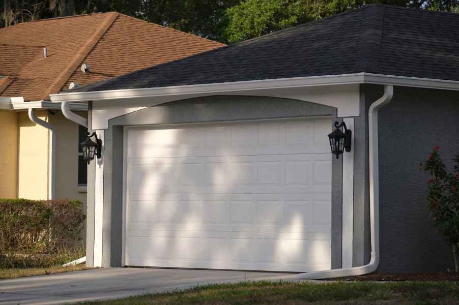 White garage door with grey and white exterior